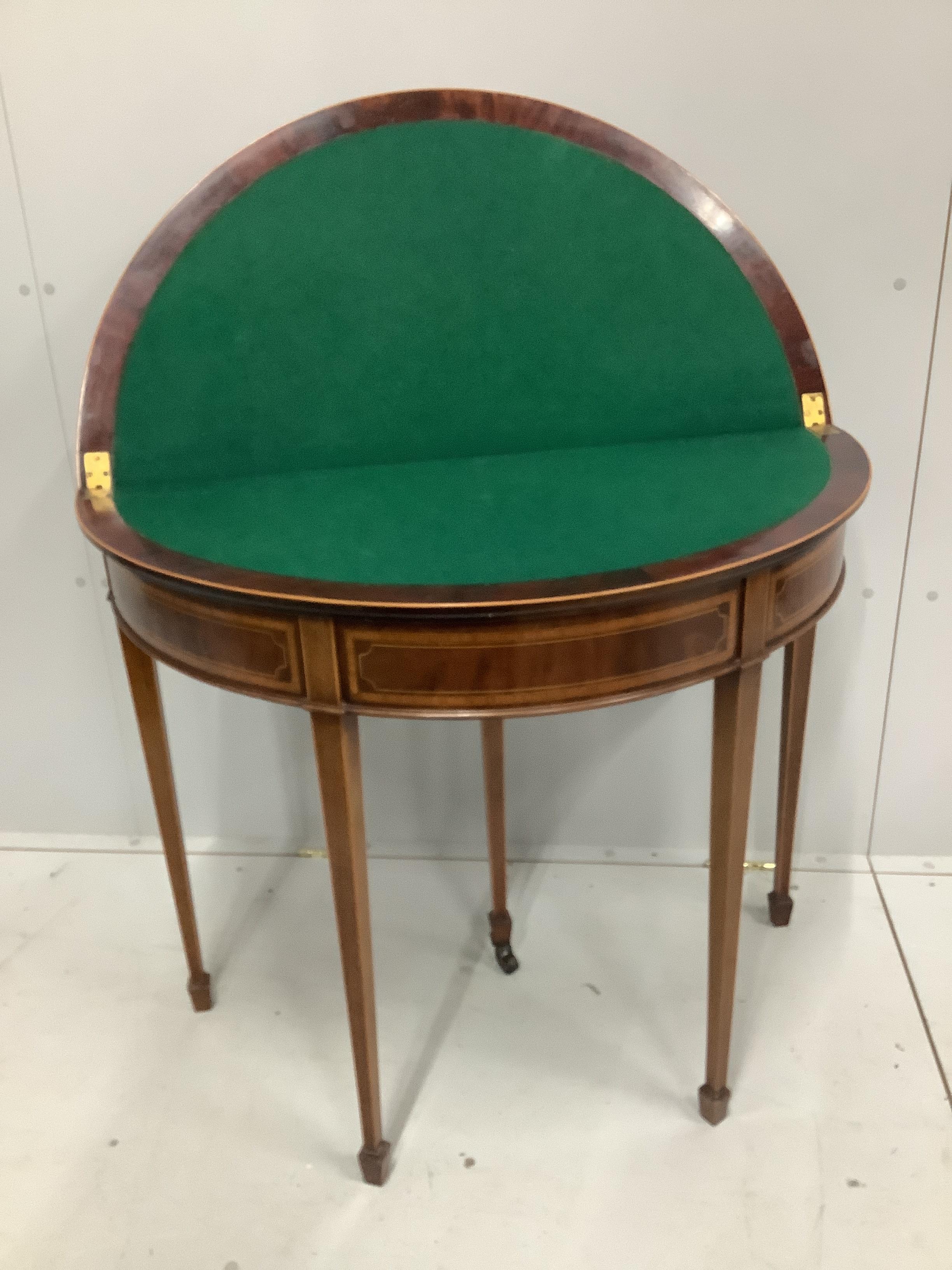 An Edwardian satinwood banded mahogany D shaped folding card table, width 91cm, depth 45cm, height 77cm